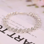 🎁Exquisite Crystal-Studded Ladies' Watch with Bracelet